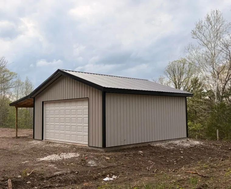 Metal garage with an attached carport built by Sundown Roofing