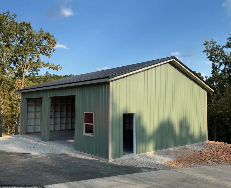Roofing services in Mountain Home, AR Post-frame shop with metal roof and siding built by Sundown Roofing