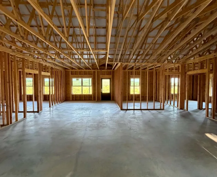 Sundown Roofing & Construction — free estimate Jason walking a customer through a build proposal on site
